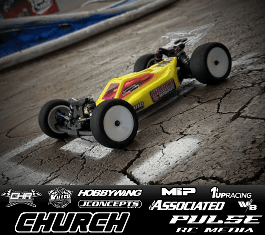 RC racing car on track with Pulse RC Media branding, featuring customizable pit board and major RC brands.